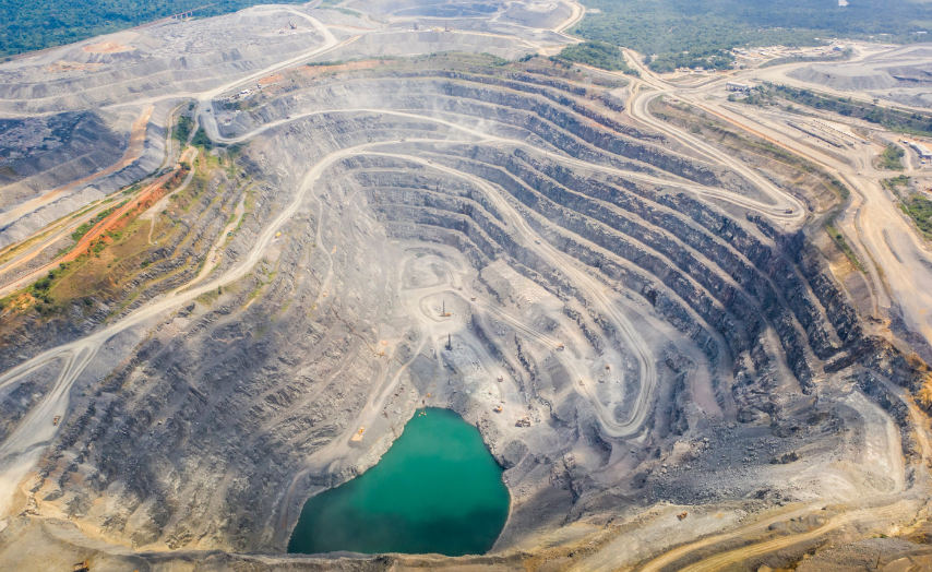Aerial view of a Vale open pit mine, showing the vast extent and depth of the mining operation.